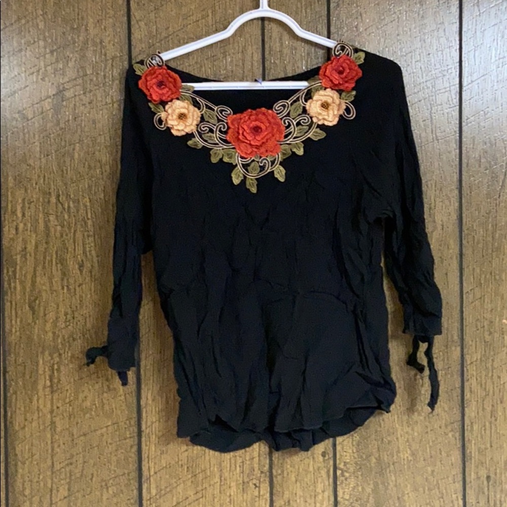 Black flowered shirt